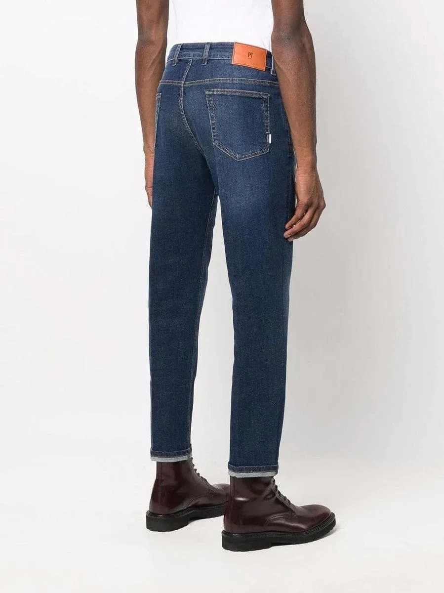 Jeans slim a vita media