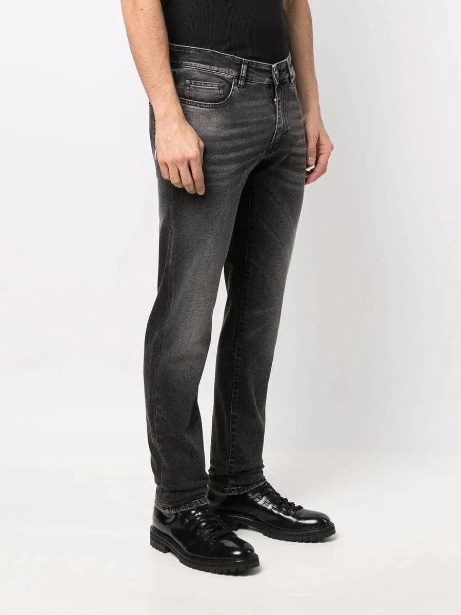 Jeans slim con effetto schiarito